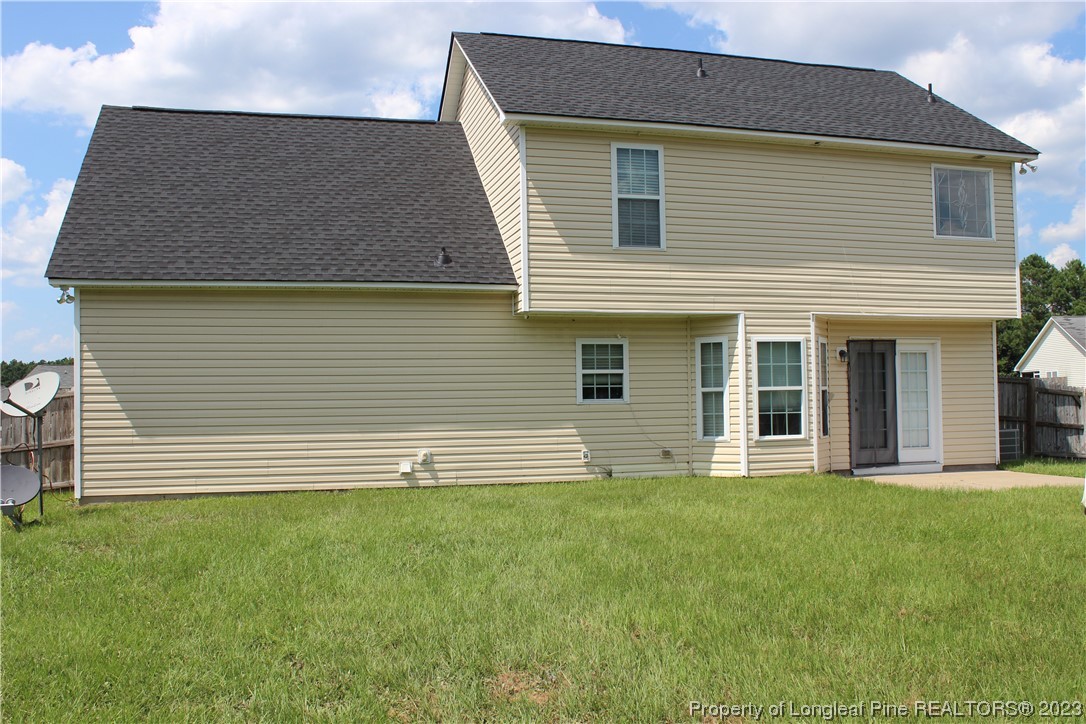 678 Cape Fear Road Raeford, NC 28376 - Photo 28 of 30 a front view of a house with a yard
