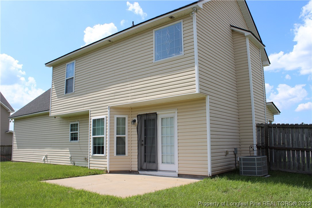678 Cape Fear Road Raeford, NC 28376 - Photo 29 of 30 a front view of a house with a garden
