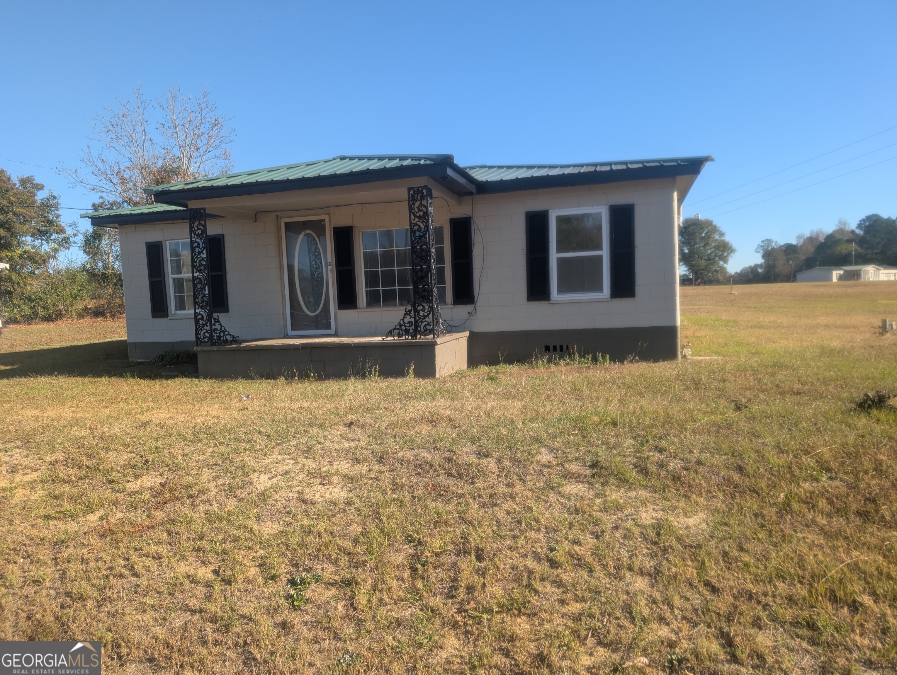 a front view of house with yard