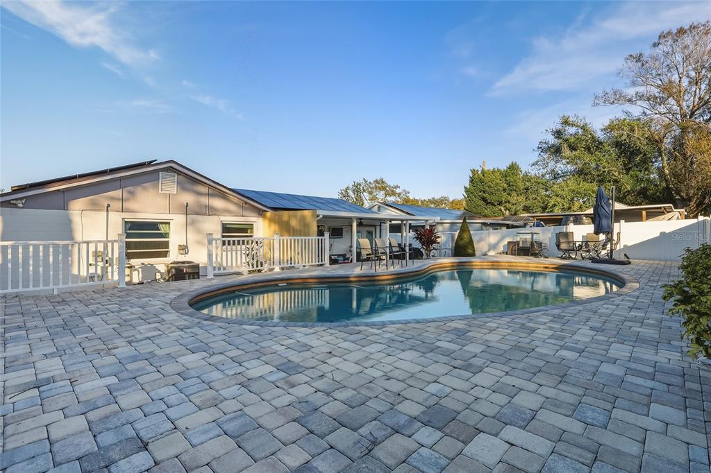 9084 Arndale Circle Tampa, FL 33615 - Photo 13 of 22 a front view of a house with swimming pool