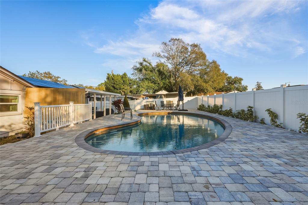 9084 Arndale Circle Tampa, FL 33615 - Photo 15 of 22 a view of outdoor space swimming pool and furniture