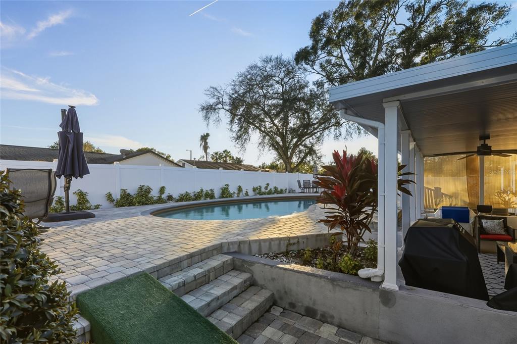 9084 Arndale Circle Tampa, FL 33615 - Photo 16 of 22 a view of a house with garden