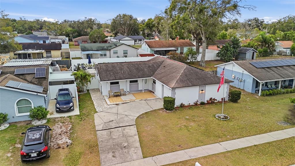 9084 Arndale Circle Tampa, FL 33615 - Photo 17 of 22 an aerial view of residential houses with yard