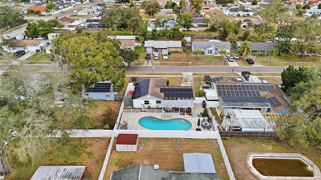 9084 Arndale Circle Tampa, FL 33615 - Photo 19 of 22 an aerial view of a house with swimming pool and outdoor seating