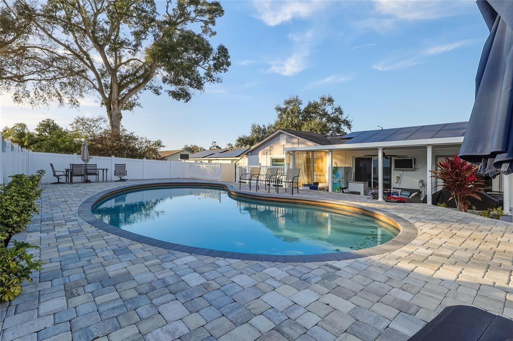 9084 Arndale Circle Tampa, FL 33615 - Photo 2 of 22 a view of outdoor space yard and swimming pool