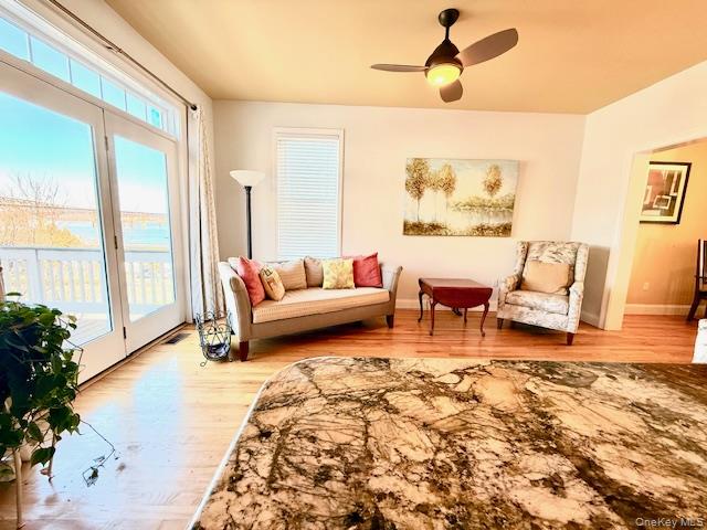 4 Broad Street Newburgh, NY 12550 - Photo 6 of 17 Sitting Room / Dining Room With Sliding Glass Doors to Deck Overlooking The River