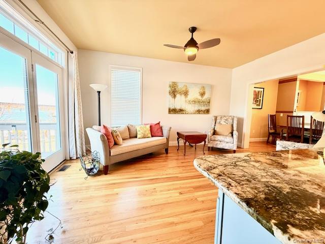 4 Broad Street Newburgh, NY 12550 - Photo 8 of 17 Sitting Room / Dining Room With Sliding Glass Doors to Deck Overlooking The River