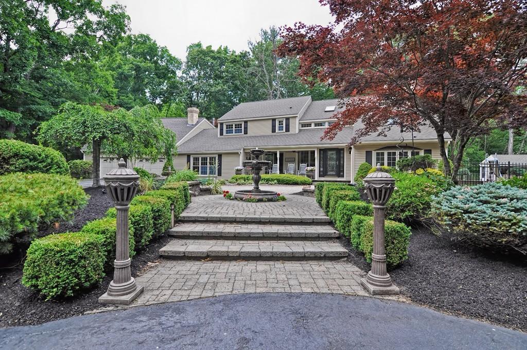 38 Johnson Road Sutton, MA 01590 - Photo 1 of 42 a front view of a house with a yard