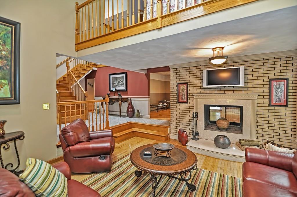 38 Johnson Road Sutton, MA 01590 - Photo 4 of 42 a living room with furniture and a fireplace