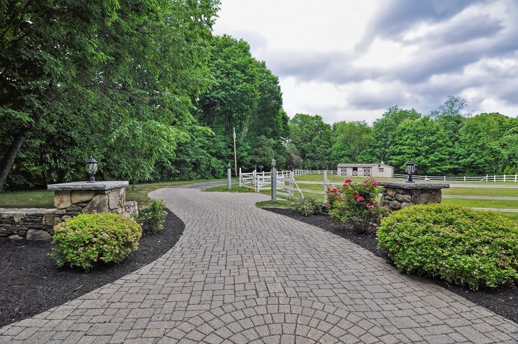 38 Johnson Road Sutton, MA 01590 - Photo 42 of 42 a view of a garden with lawn chairs