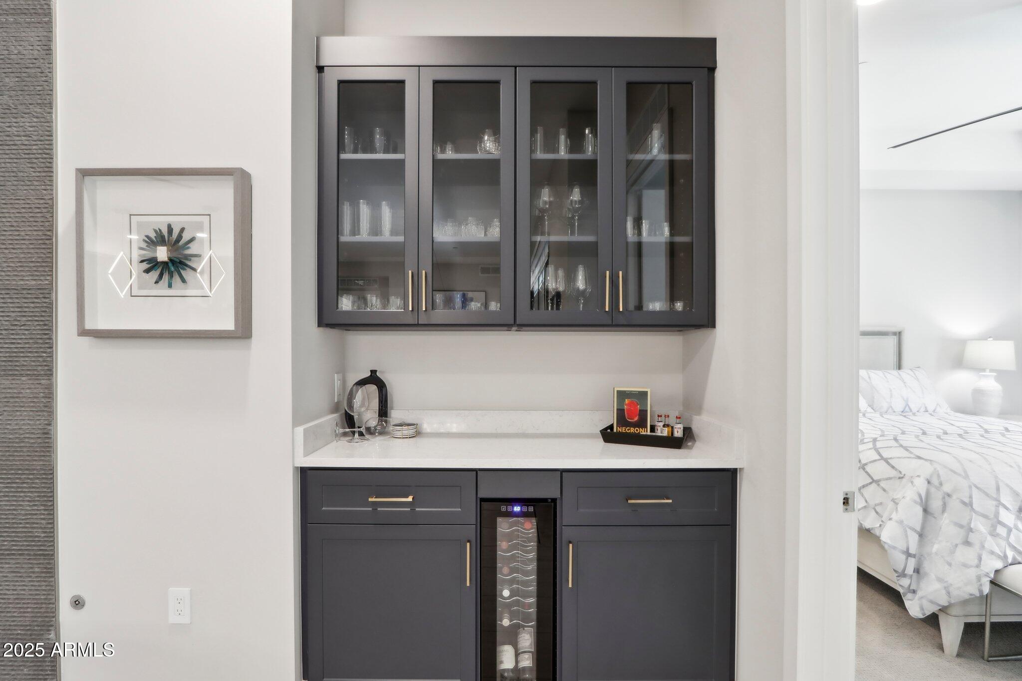5250 East Deer Valley Drive, Unit 247 Phoenix, AZ 85054 - Photo 9 of 56 a bathroom with a sink and a mirror
