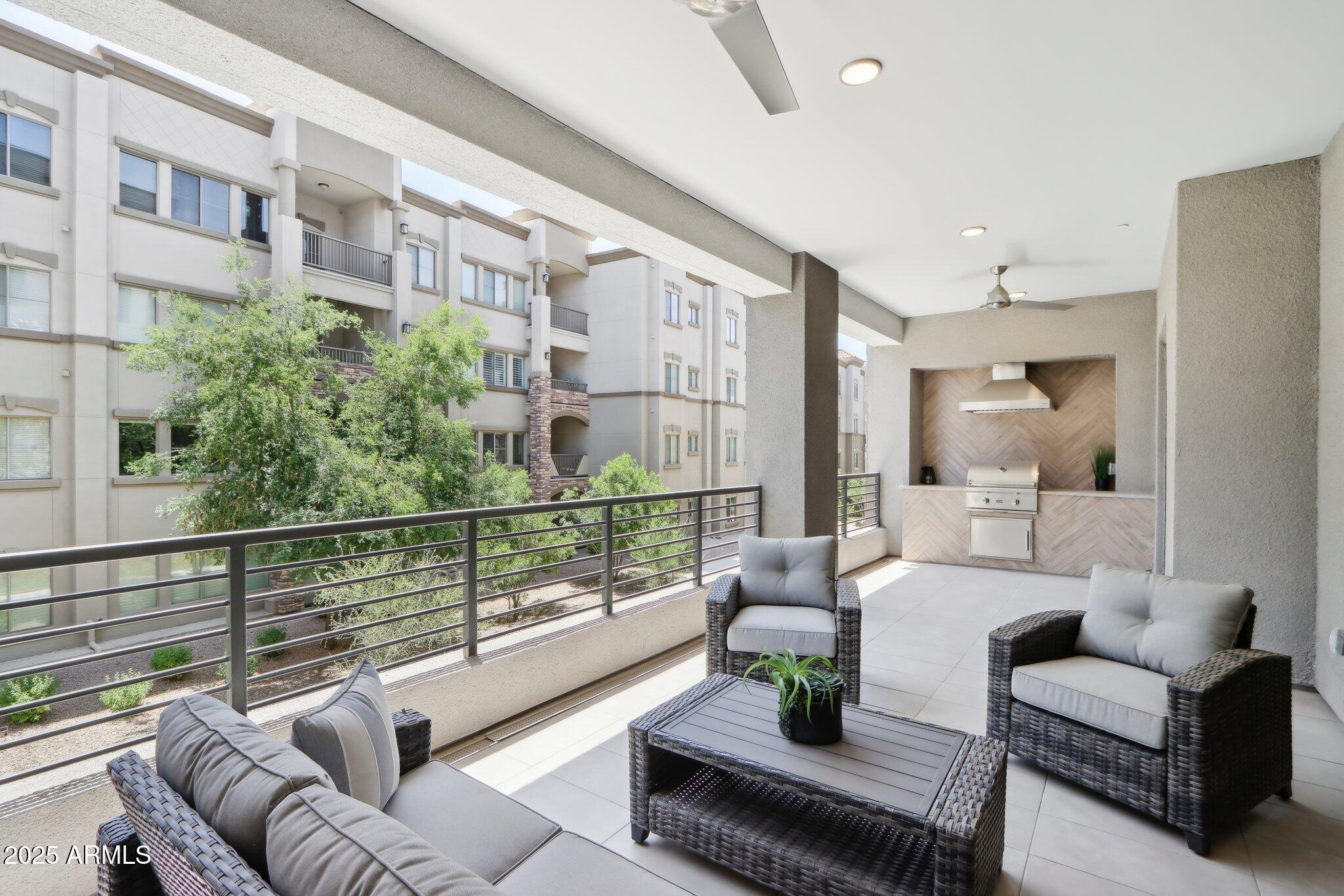 5250 East Deer Valley Drive, Unit 247 Phoenix, AZ 85054 - Photo 26 of 56 a balcony with furniture