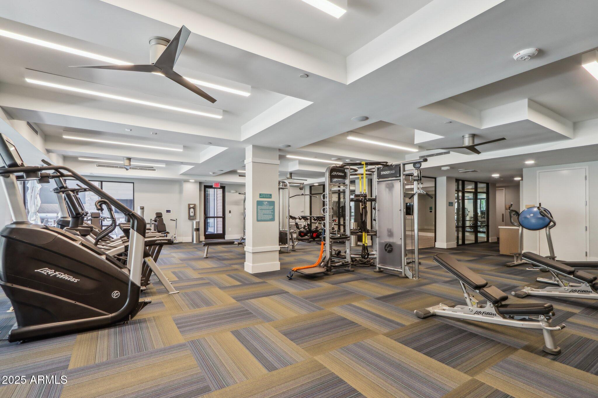 5250 East Deer Valley Drive, Unit 247 Phoenix, AZ 85054 - Photo 38 of 56 a view of a room with gym equipment