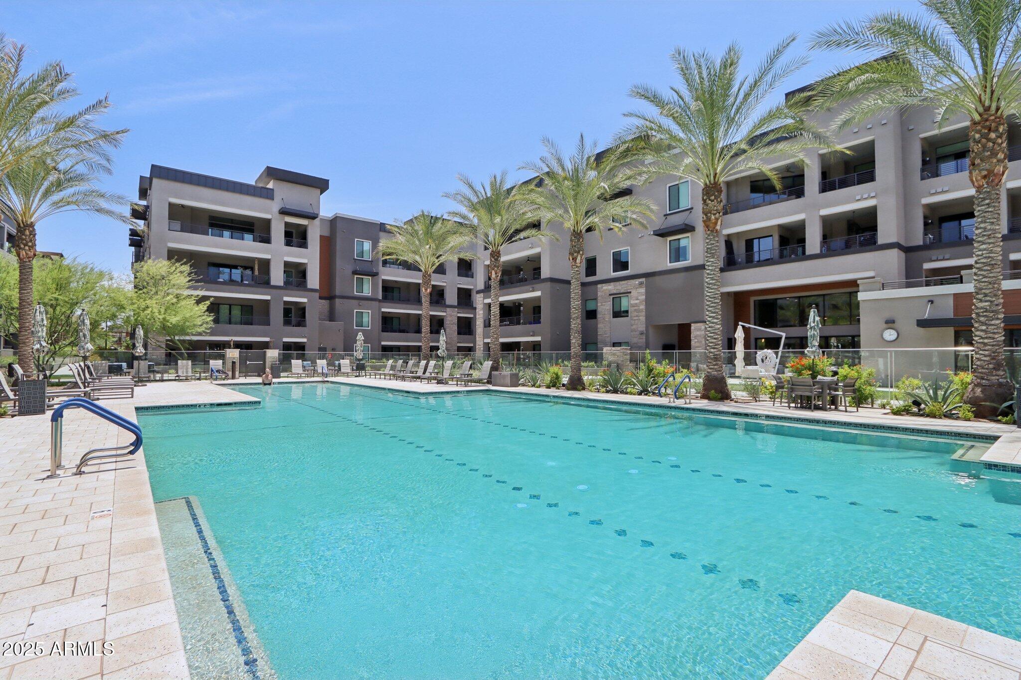 5250 East Deer Valley Drive, Unit 247 Phoenix, AZ 85054 - Photo 47 of 56 a front view of building with yard