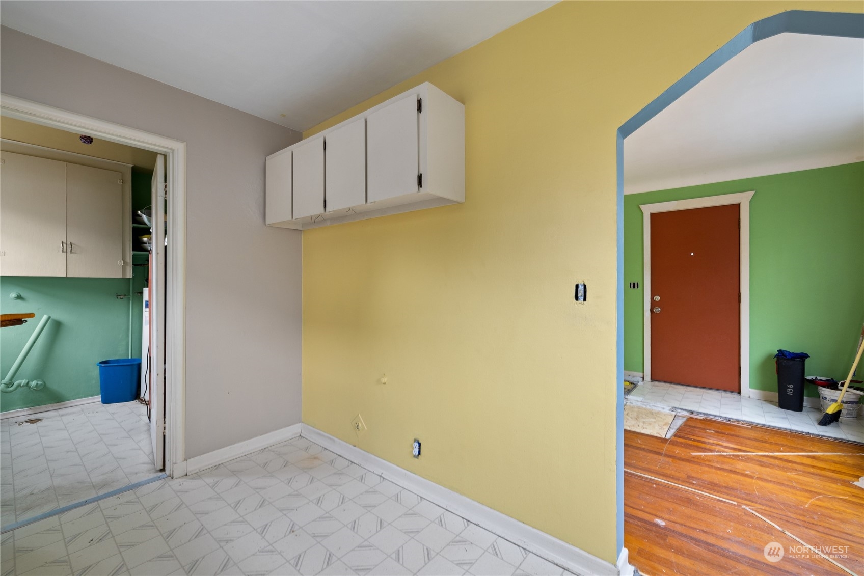 1136 Naval Avenue Bremerton, WA 98312 - Photo 22 of 34 a view of a livingroom with wooden floor and a ceiling fan