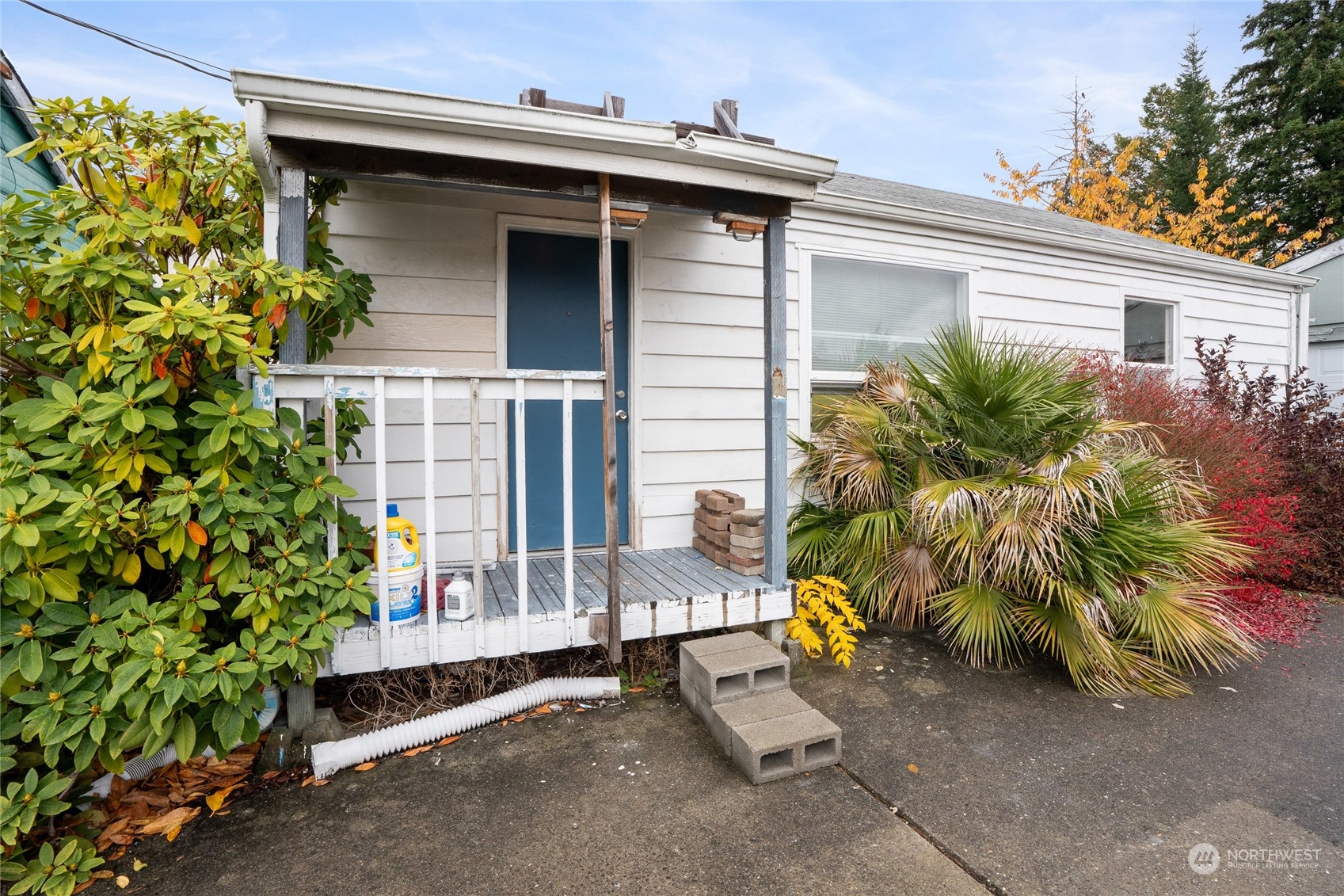 1136 Naval Avenue Bremerton, WA 98312 - Photo 3 of 34 a view of a house with a small yard and plants