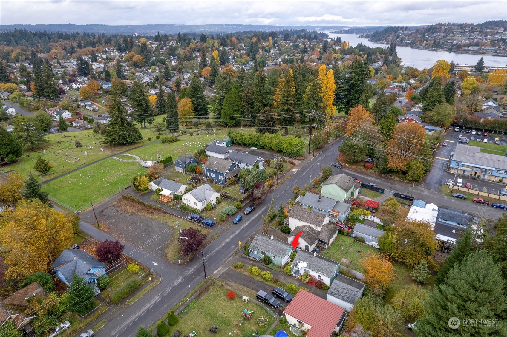 1136 Naval Avenue Bremerton, WA 98312 - Photo 33 of 34 an aerial view of a city with mountains