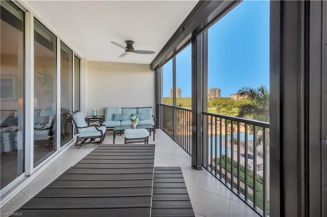 a view of balcony with wooden floor