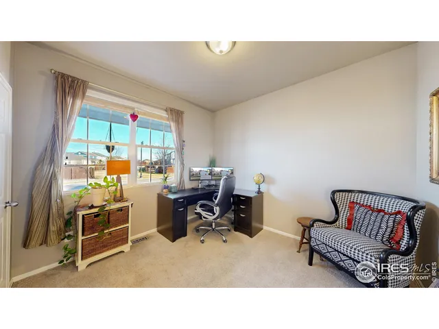 a room with furniture and a window