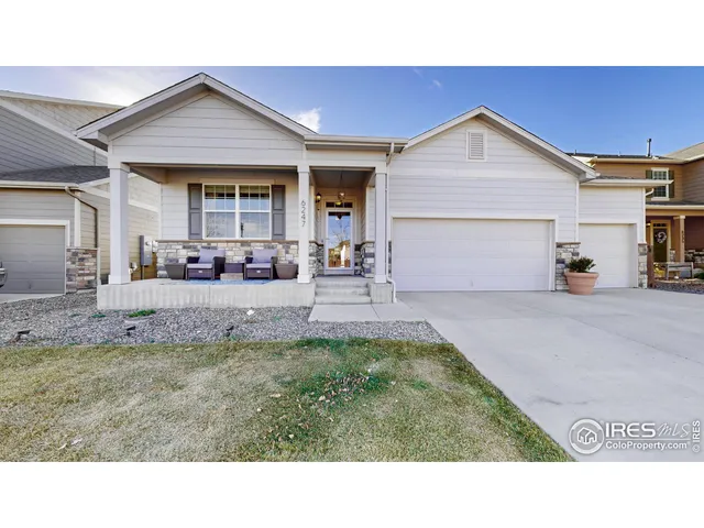 a black and white photo of a house