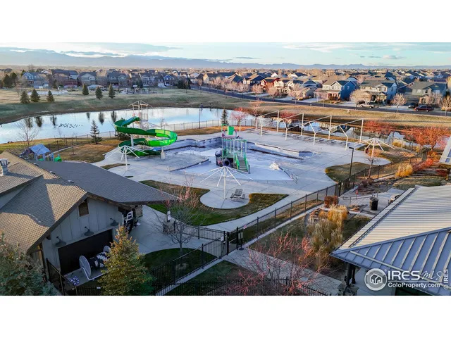 a terrace with outdoor seating city view and barbeque oven