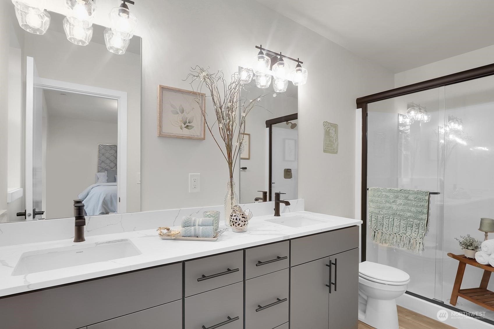2527 Gibson Road, Unit E7 Everett, WA 98204 - Photo 14 of 21 a bathroom with a double vanity sink mirror and toilet