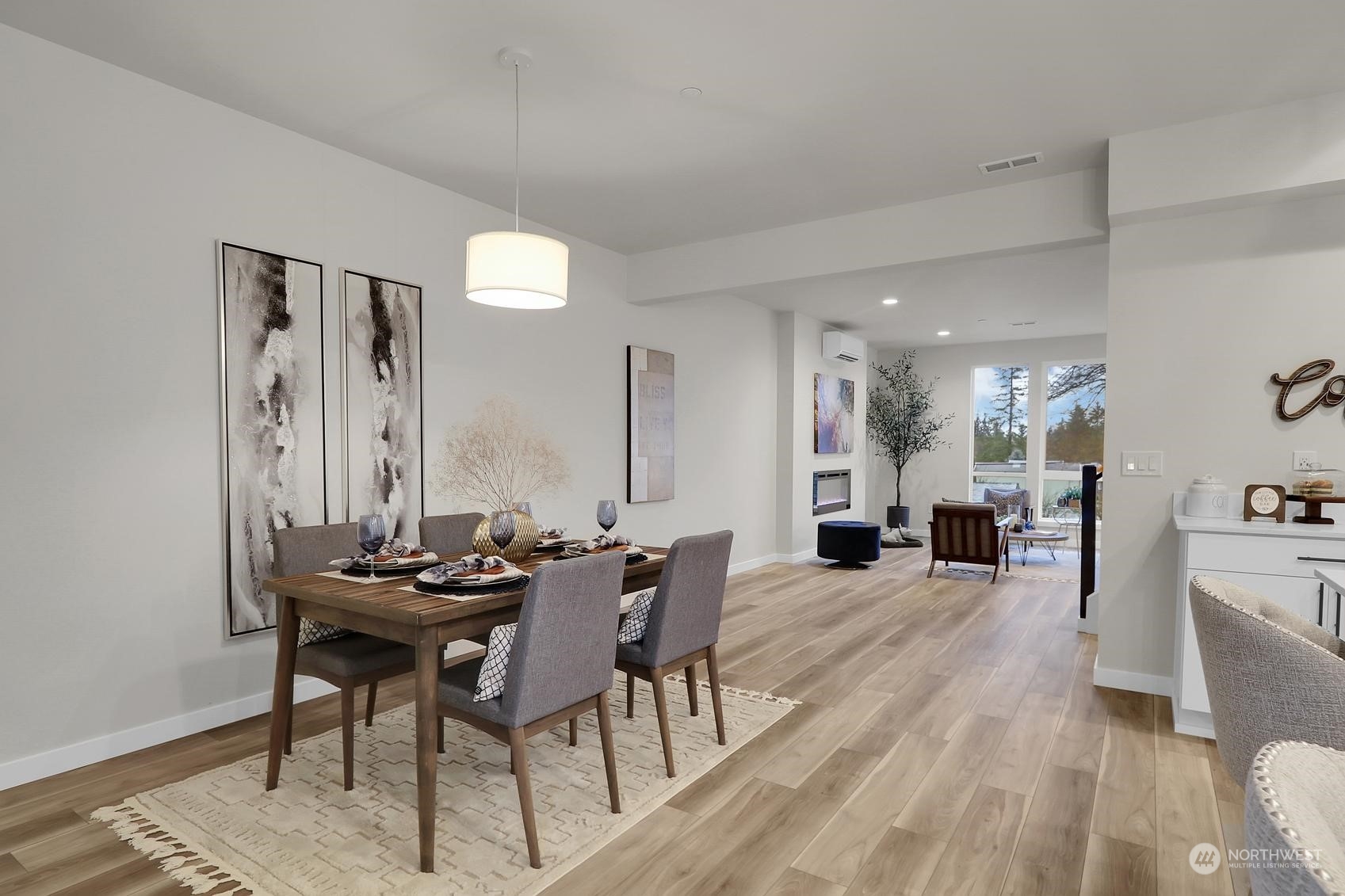 2527 Gibson Road, Unit E7 Everett, WA 98204 - Photo 5 of 21 a living room with furniture and wooden floor