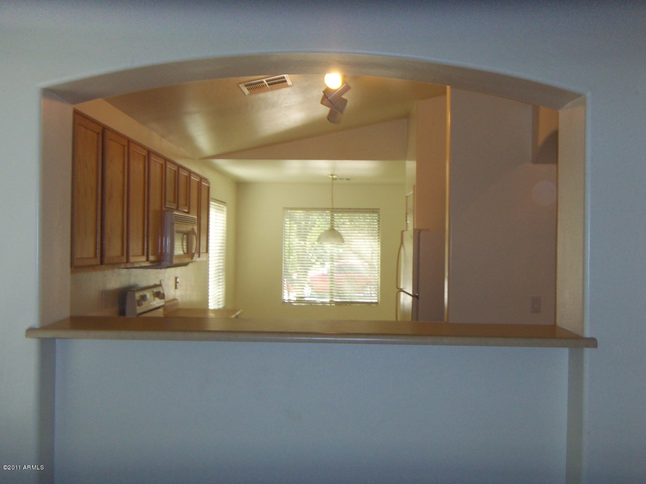 25860 West Dunlap Road Buckeye, AZ 85326 - Photo 7 of 10 Kitchen Opens to Great Room