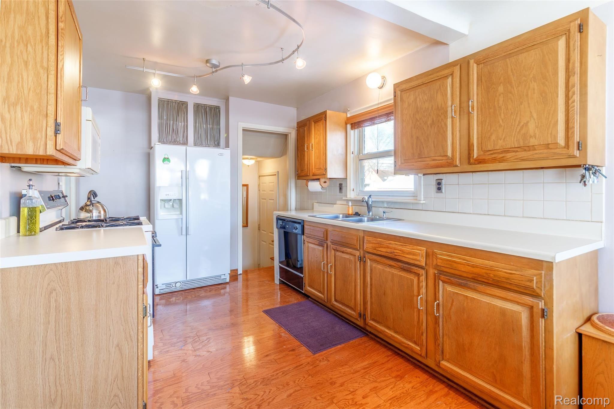 Open kitchen with lots of cabinets and counter space