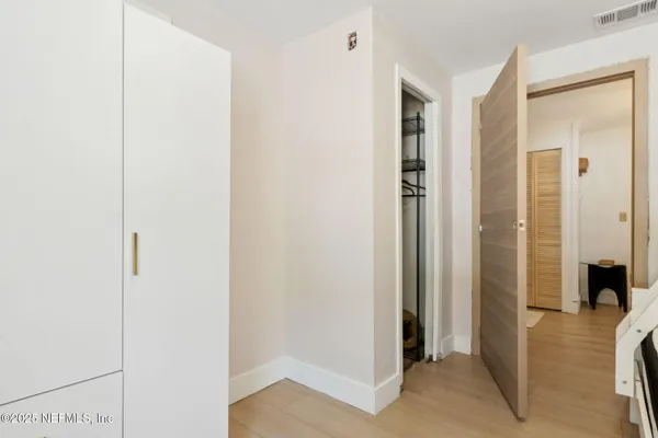 a view of a bathroom from the hallway