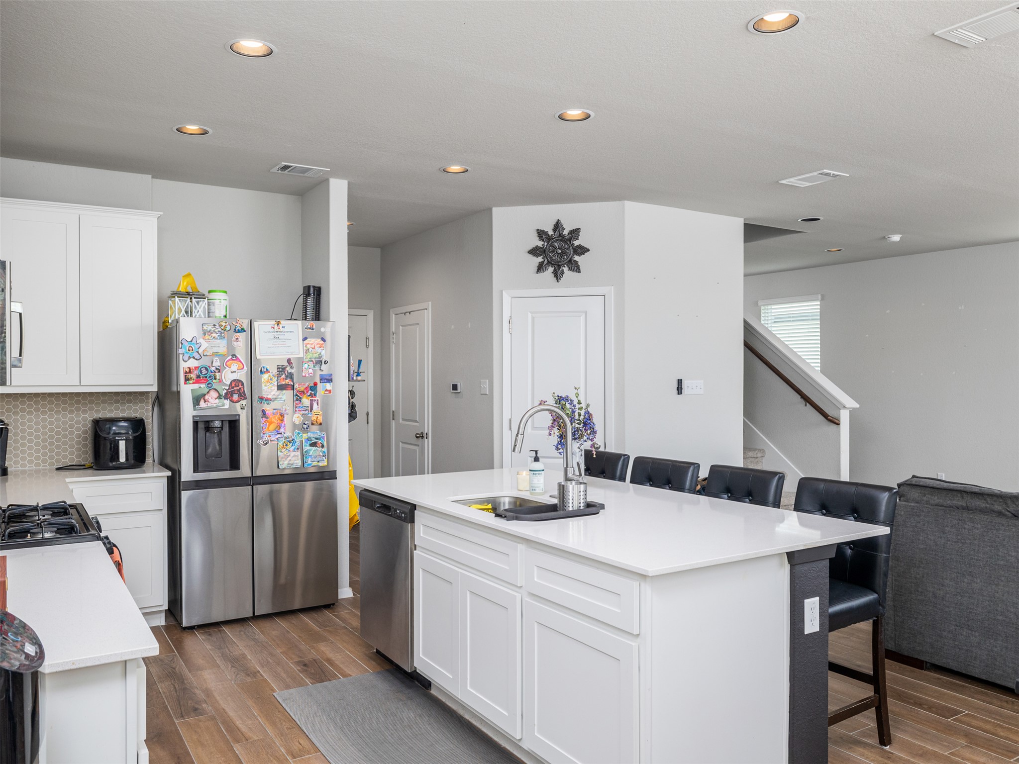 121 Graver Street Georgetown, TX 78626 - Photo 10 of 28 Culinary creations come to life in this kitchen, complete with a generous island for entertaining.