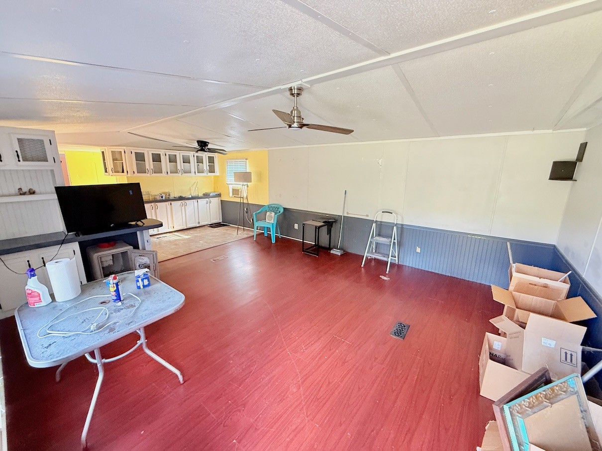 104 Vantrease Avenue Auburntown, TN 37016 - Photo 13 of 24 a living room with furniture and a wooden floor