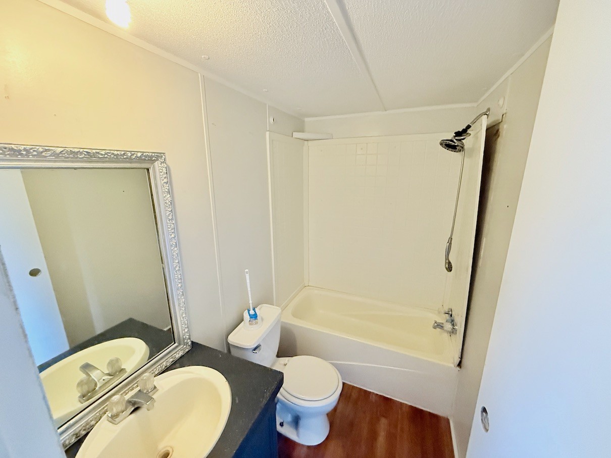 104 Vantrease Avenue Auburntown, TN 37016 - Photo 17 of 24 a bathroom with a sink toilet and shower