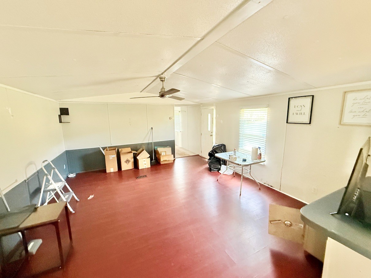 104 Vantrease Avenue Auburntown, TN 37016 - Photo 18 of 24 a living room with furniture and a flat screen tv