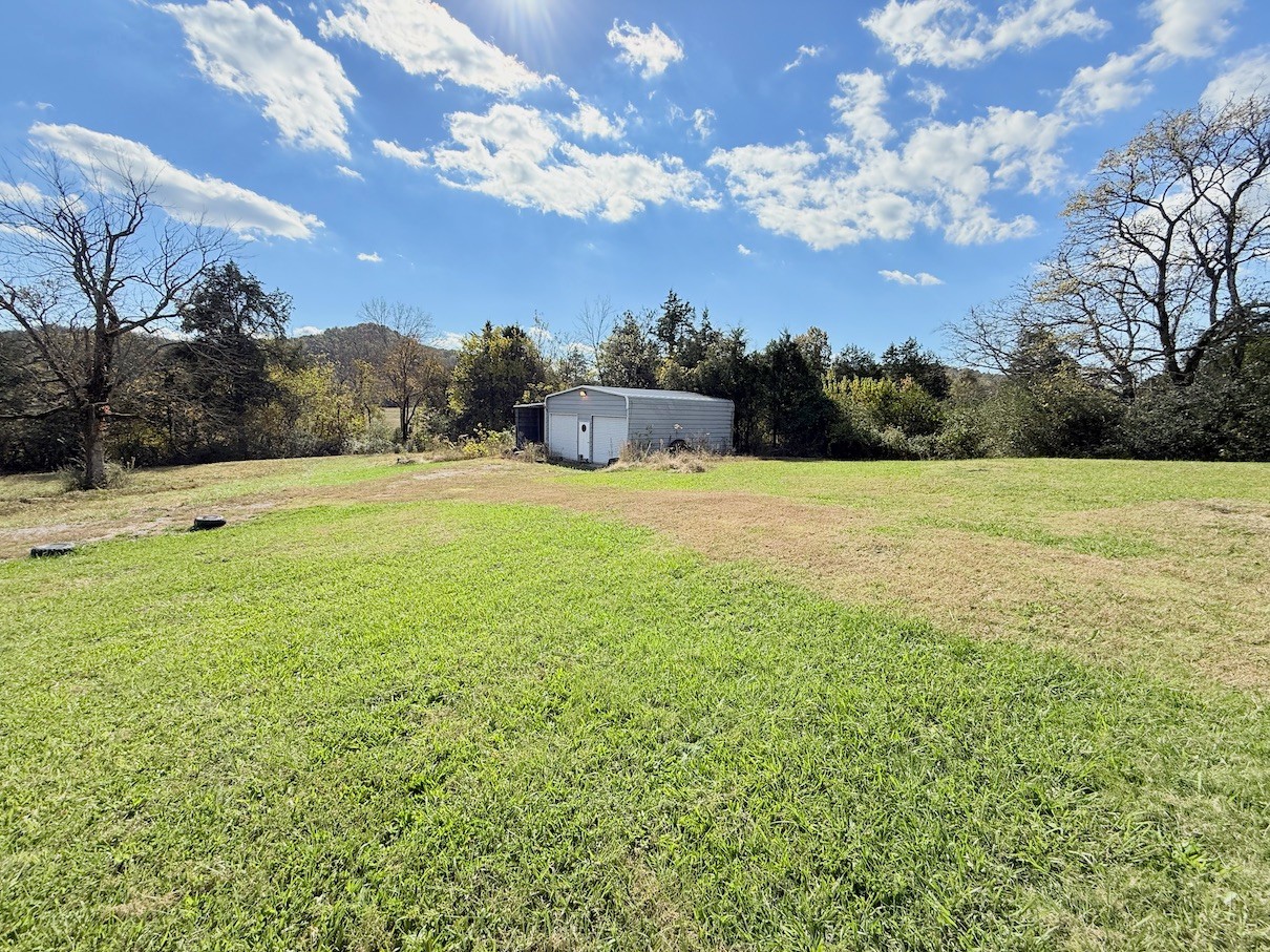 104 Vantrease Avenue Auburntown, TN 37016 - Photo 21 of 24 a view of an outdoor space and a yard