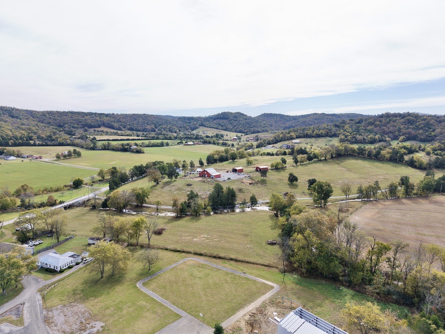 104 Vantrease Avenue Auburntown, TN 37016 - Photo 6 of 24 a view of a lake with a mountain