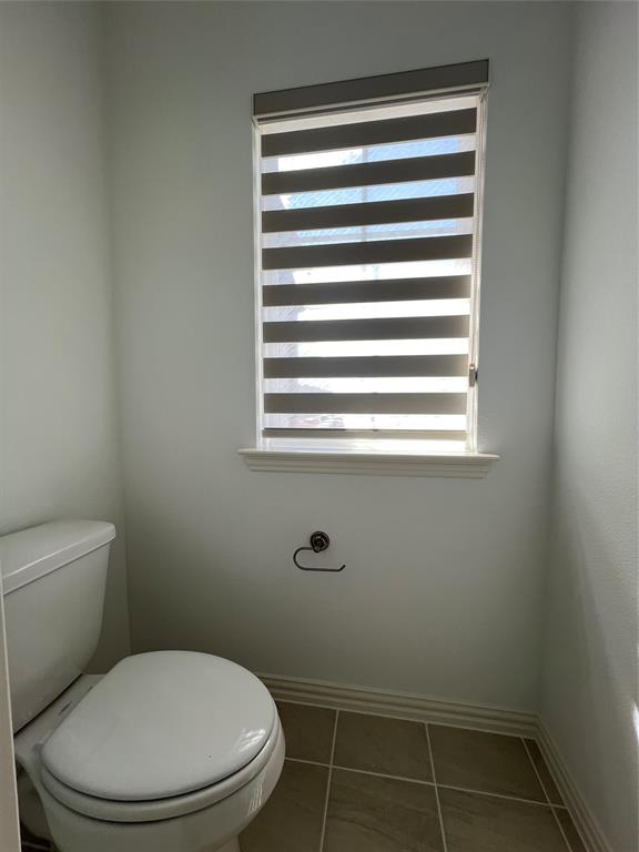 2616 Rolling Mdw Road Celina, TX 75009 - Photo 20 of 35 Bathroom with toilet and tile patterned flooring