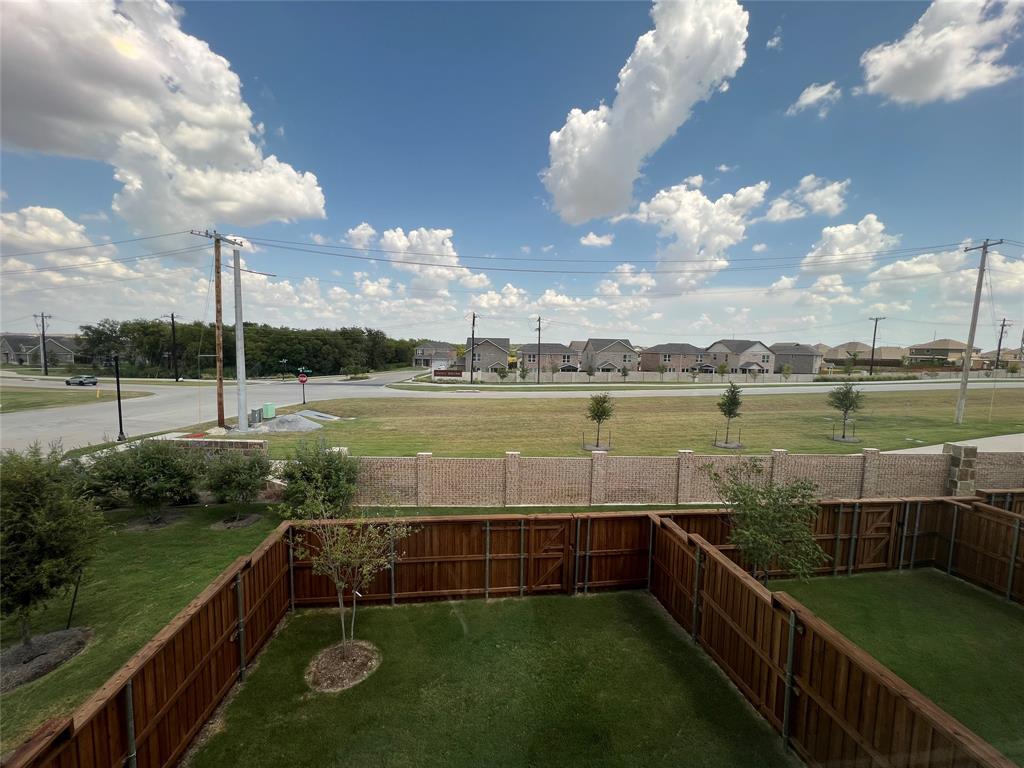2616 Rolling Mdw Road Celina, TX 75009 - Photo 27 of 35 Fenced backyard featuring a residential view