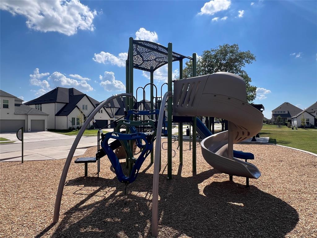 2616 Rolling Mdw Road Celina, TX 75009 - Photo 34 of 35 Community play area featuring a residential view