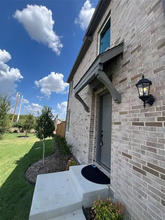 a view of a back yard of the house