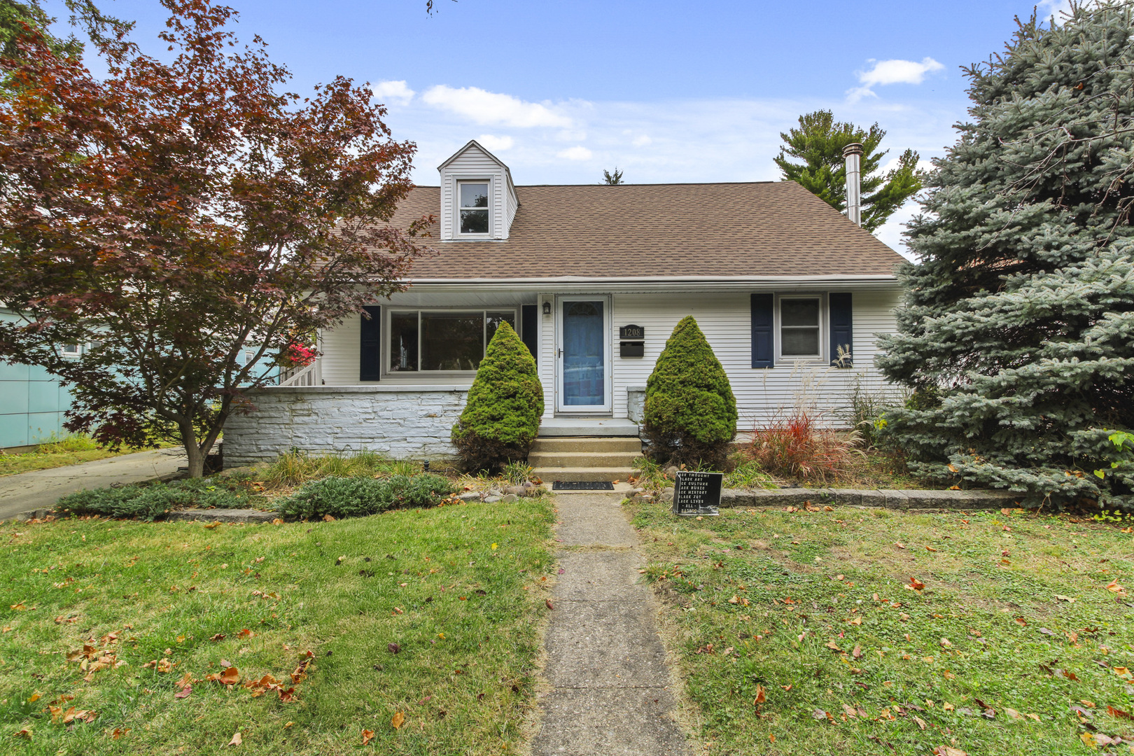 1208 West William Street Champaign, IL 61821 - Photo 1 of 30 a view of a house with yard and tree s