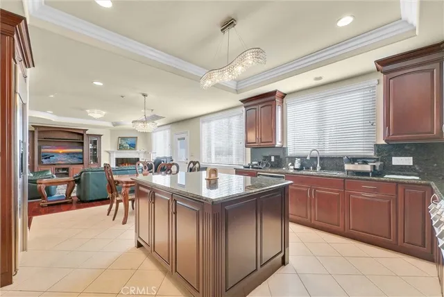 a kitchen with kitchen island granite countertop lots of counter top space