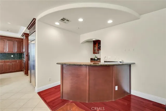 a bedroom with a bed and a walk in closet