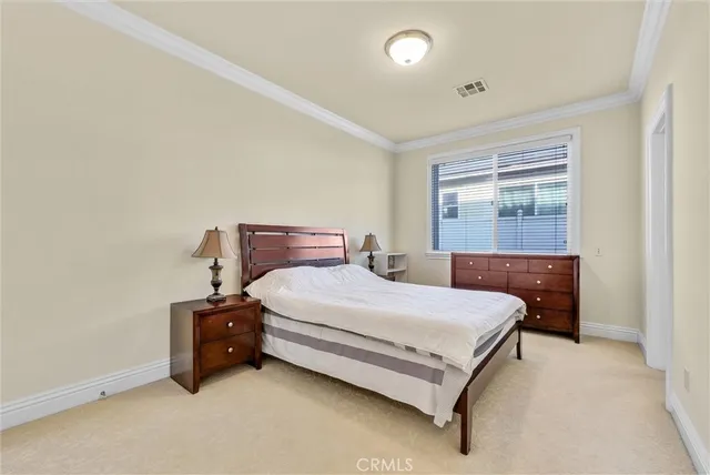 a bathroom with a toilet a sink and a mirror