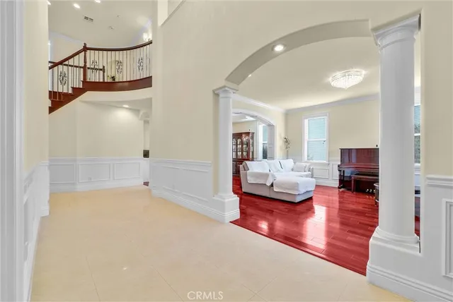 a living room with furniture and a table