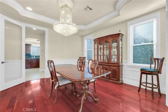 a kitchen with granite countertop stainless steel appliances a sink and cabinets