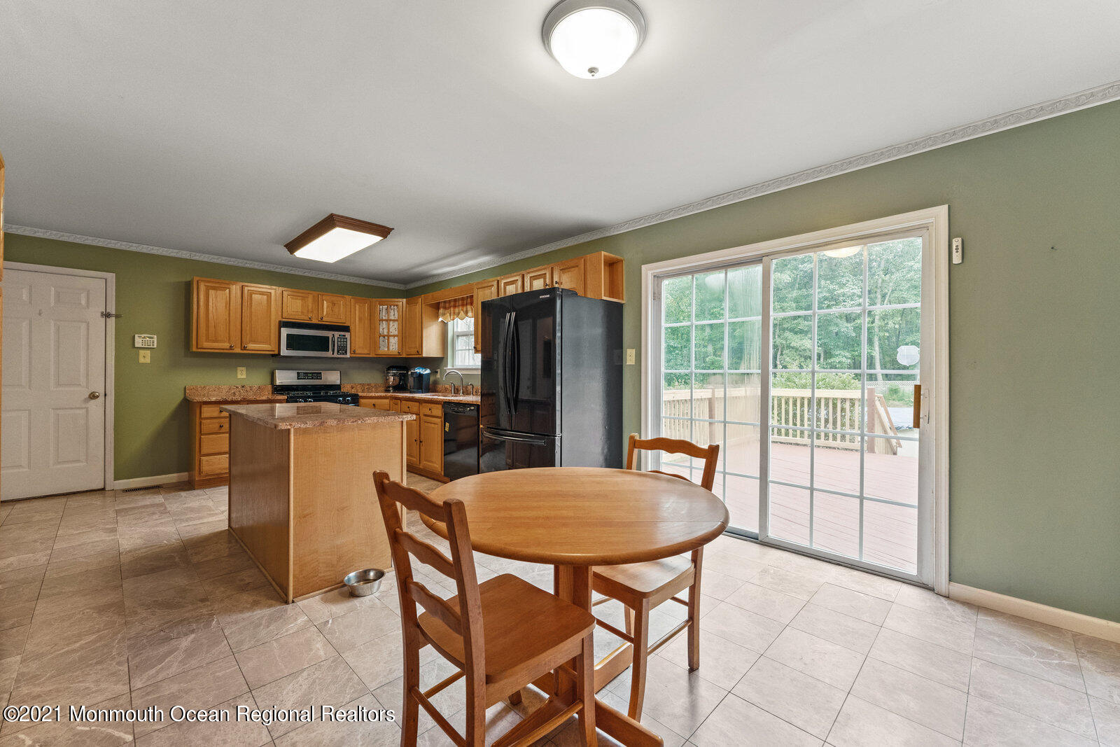 210 North Success Road Cream Ridge, NJ 08514 - Photo 13 of 50 a dining room with furniture and a floor to ceiling window