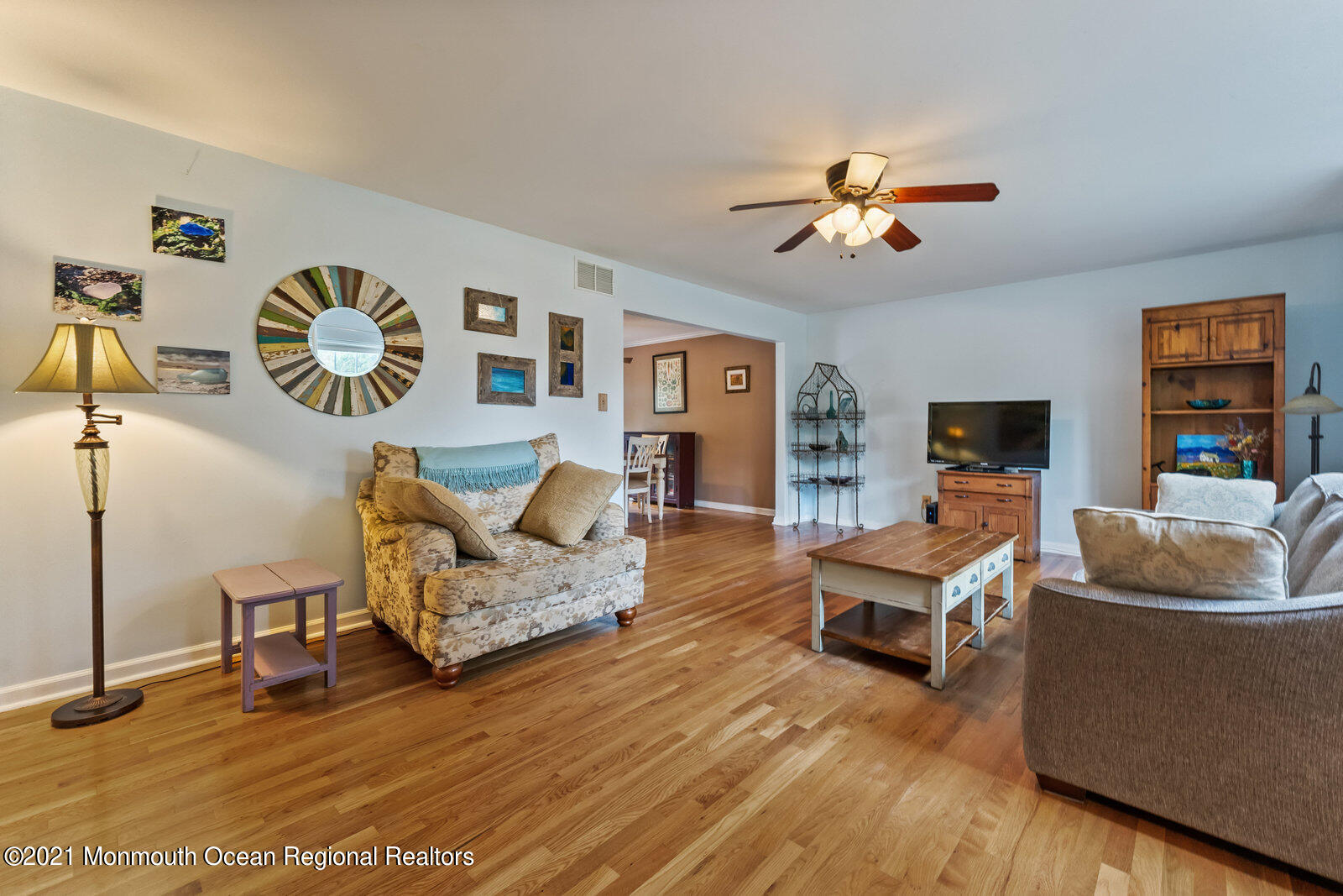 210 North Success Road Cream Ridge, NJ 08514 - Photo 7 of 50 a living room with furniture and a flat screen tv