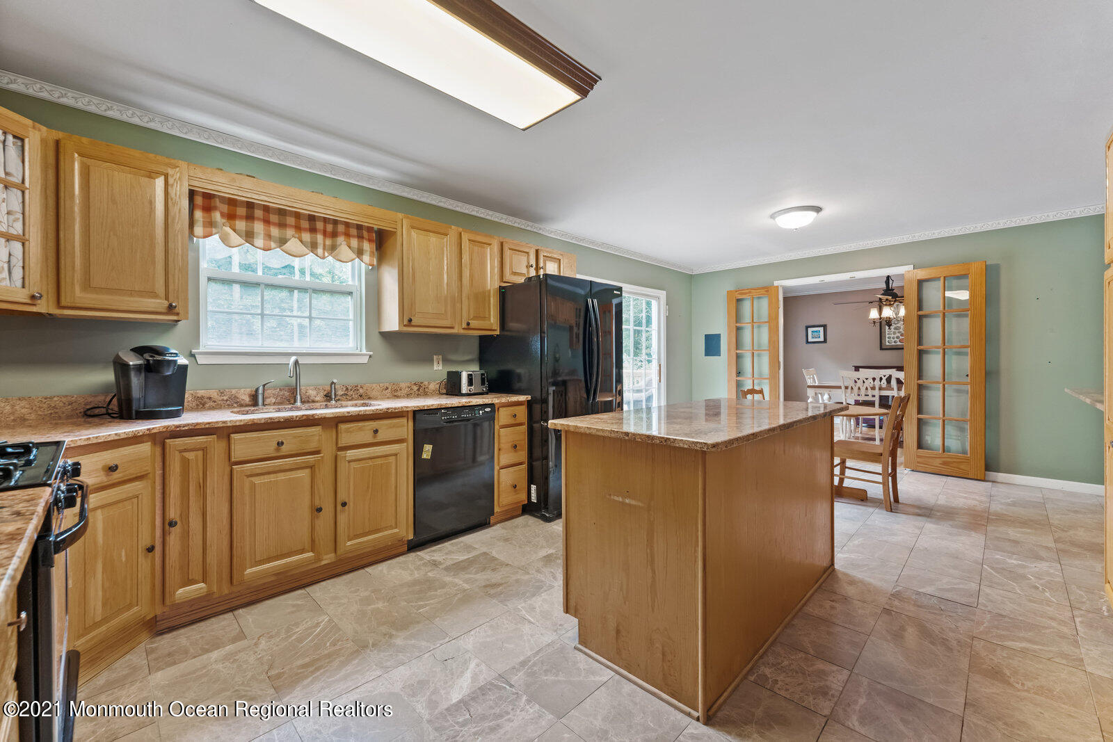 210 North Success Road Cream Ridge, NJ 08514 - Photo 9 of 50 a kitchen with stainless steel appliances granite countertop a stove top oven a sink a counter top space and cabinets
