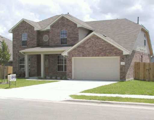 a front view of house with yard